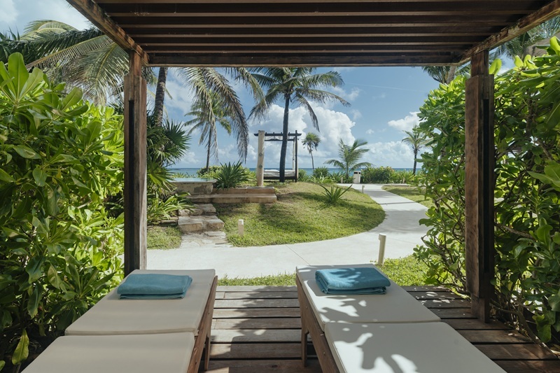 Ground floor Garden Suite with easy pool access and lush tropical landscaping