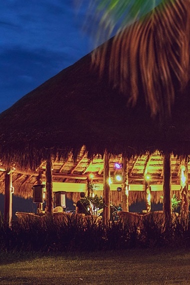 Modern Lobby Bar at Akumal Bay Beach Wellness Resort serving premium cocktails